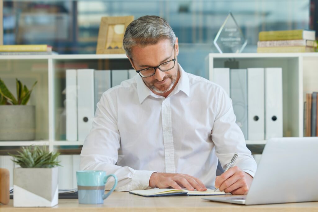 accountant working at desk in office